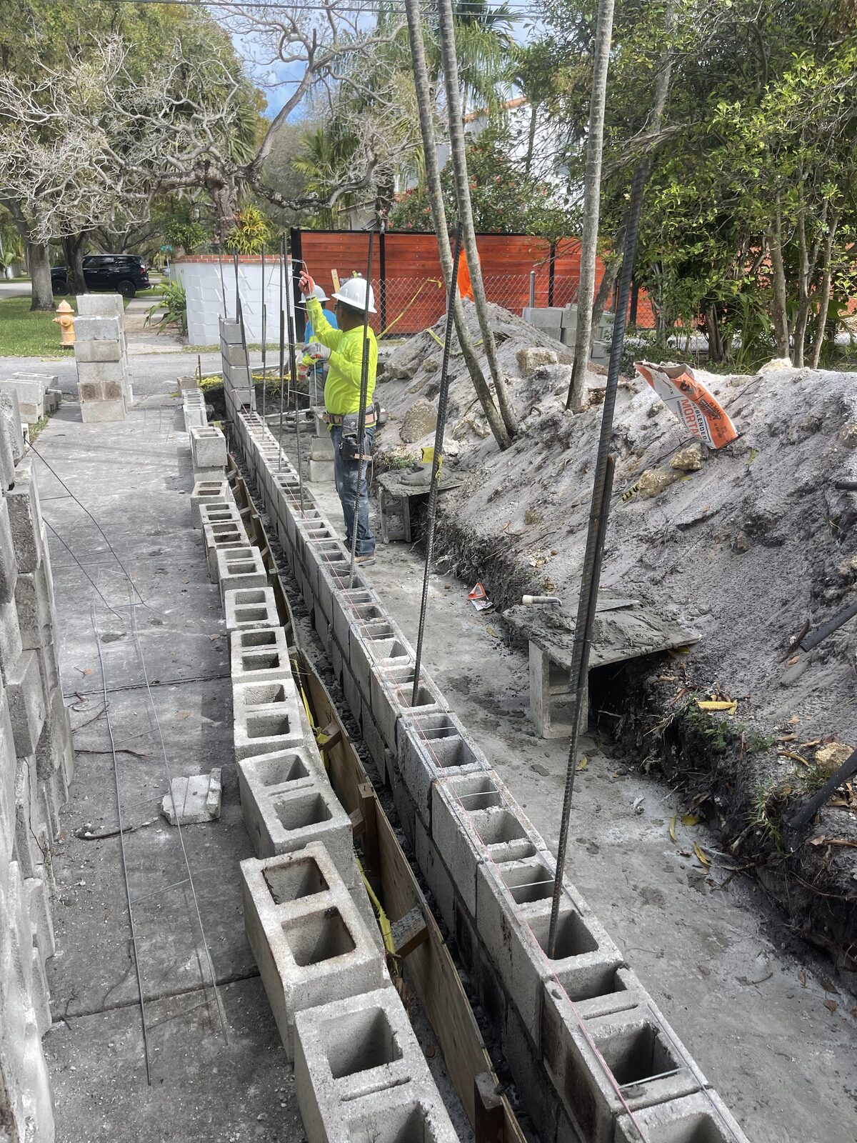 Seawall construction with crew in hard hats