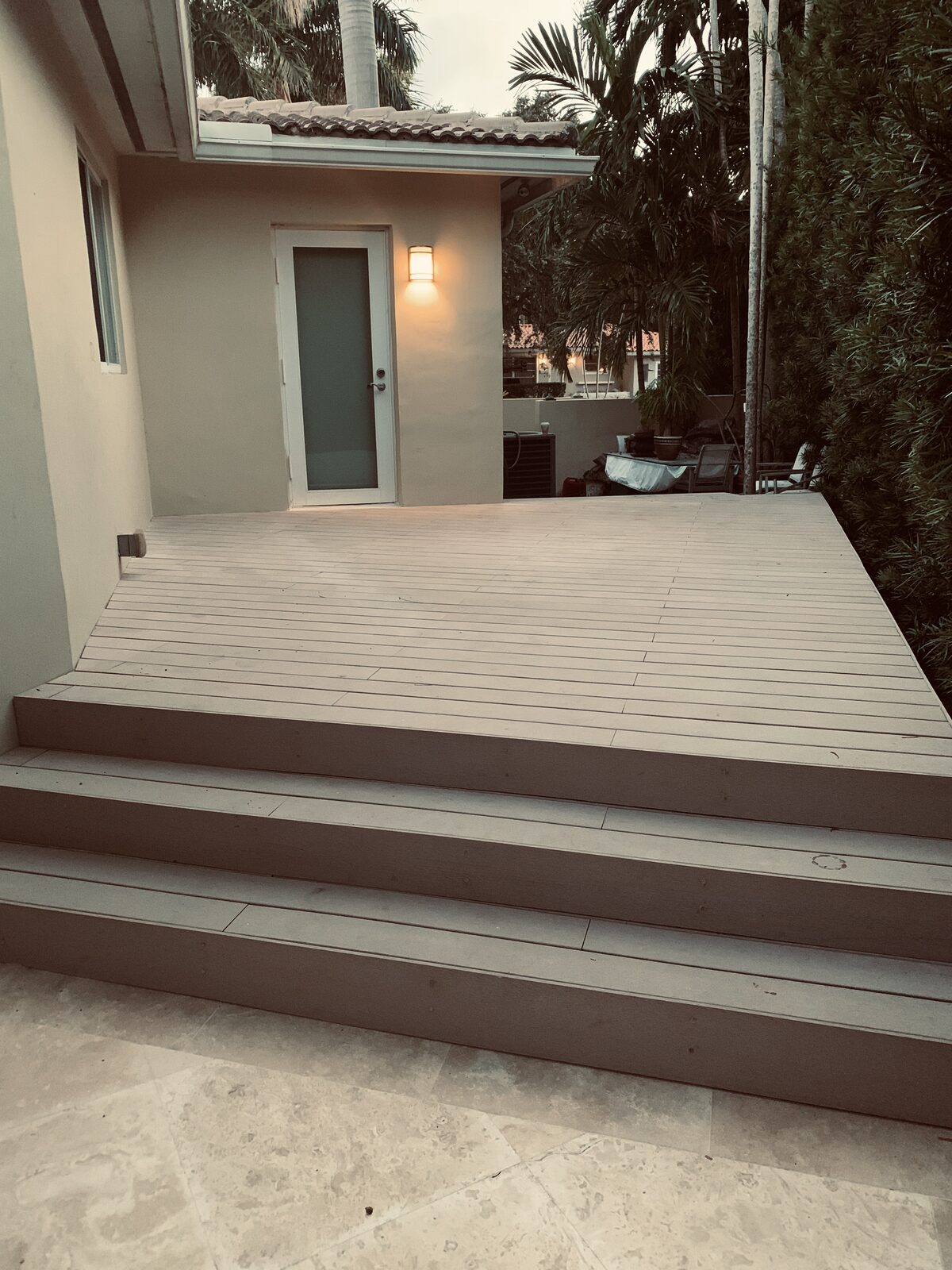 Finished composite deck with steps