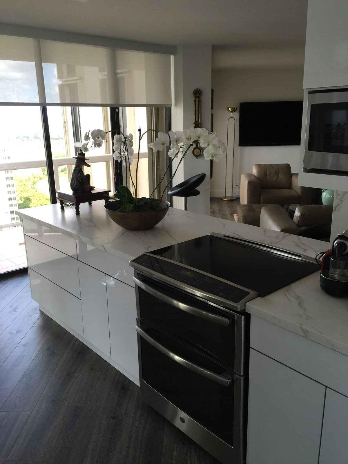 Marble island with stainless cooktop