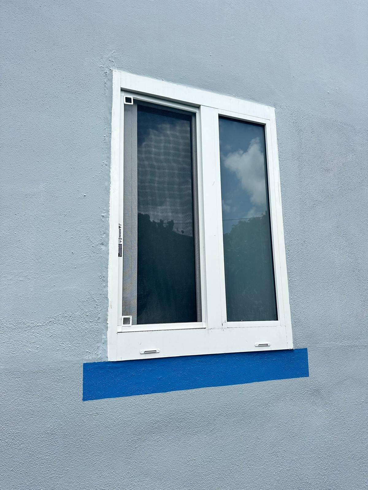 Tall vertical impact window installation